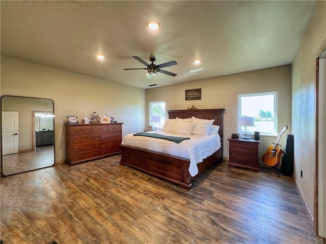 bedroom featuring recessed lighting, baseboards, and wood finished floors