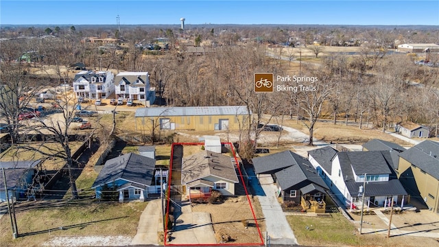 birds eye view of property with a residential view