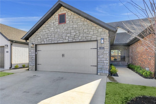 garage with concrete driveway