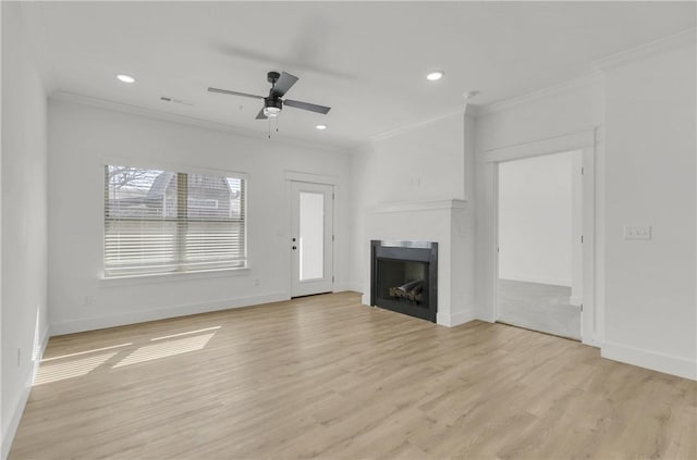 unfurnished living room featuring light wood-style flooring, crown molding, and ceiling fan