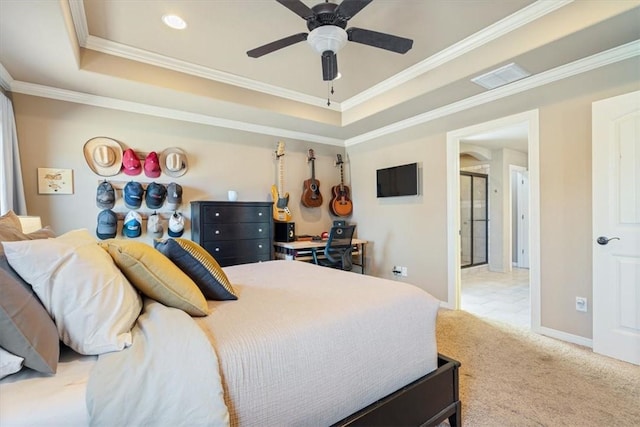 carpeted bedroom with baseboards, visible vents, recessed lighting, ornamental molding, and a raised ceiling