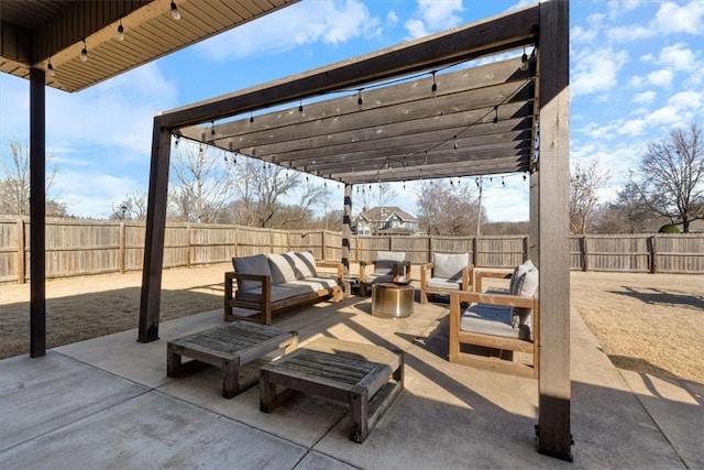 view of patio / terrace featuring an outdoor living space, a fenced backyard, and a pergola