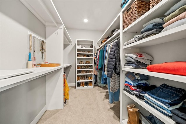 spacious closet with carpet flooring