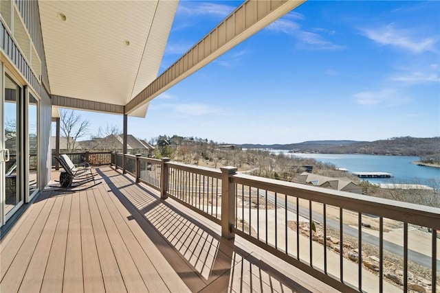 wooden terrace with a water view