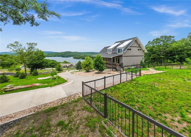 14137 Ozark Dr, Garfield, AR 72732 - view of home's exterior with a water view and driveway
