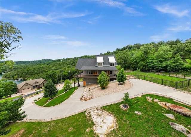 14137 Ozark Dr, Garfield, AR 72732 - view of front of property with concrete driveway and a forest view