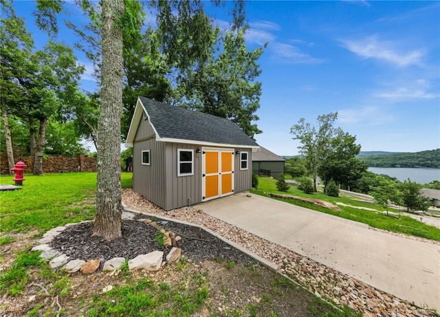14137 Ozark Dr, Garfield, AR 72732 - view of outbuilding featuring a water view