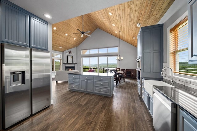 14137 Ozark Dr, Garfield, AR 72732 - kitchen featuring stainless steel appliances, wood ceiling, gray cabinets, a ceiling fan, and dark wood finished floors