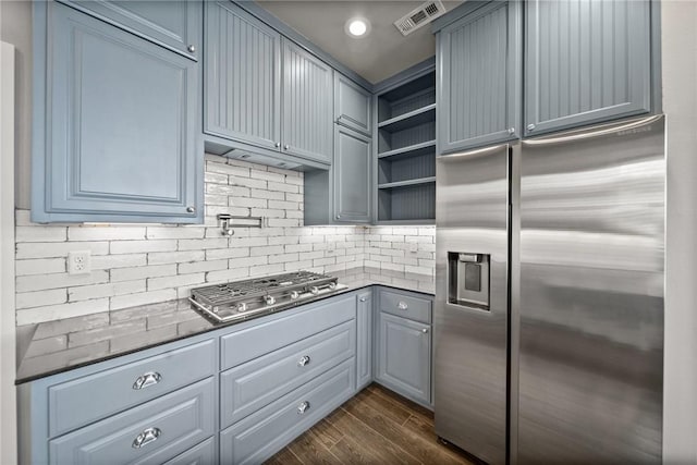 14137 Ozark Dr, Garfield, AR 72732 - kitchen with stainless steel appliances, open shelves, dark wood finished floors, decorative backsplash, and gray cabinets