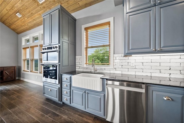 14137 Ozark Dr, Garfield, AR 72732 - kitchen with appliances with stainless steel finishes, dark countertops, plenty of natural light, decorative backsplash, and wood ceiling