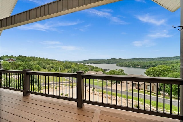 14137 Ozark Dr, Garfield, AR 72732 - wooden deck featuring a water view and a wooded view