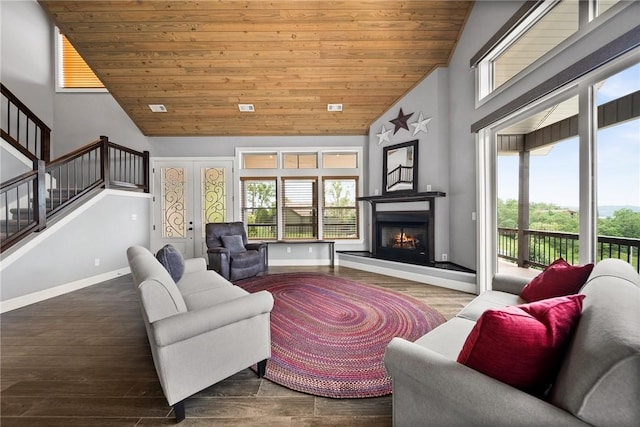 14137 Ozark Dr, Garfield, AR 72732 - living room with high vaulted ceiling, plenty of natural light, wood finished floors, wooden ceiling, and stairway