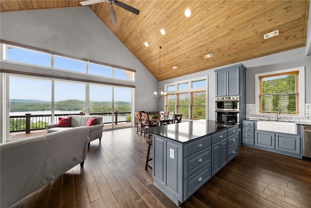 14137 Ozark Dr, Garfield, AR 72732 - kitchen featuring gray cabinets, high vaulted ceiling, wood ceiling, open floor plan, and a ceiling fan