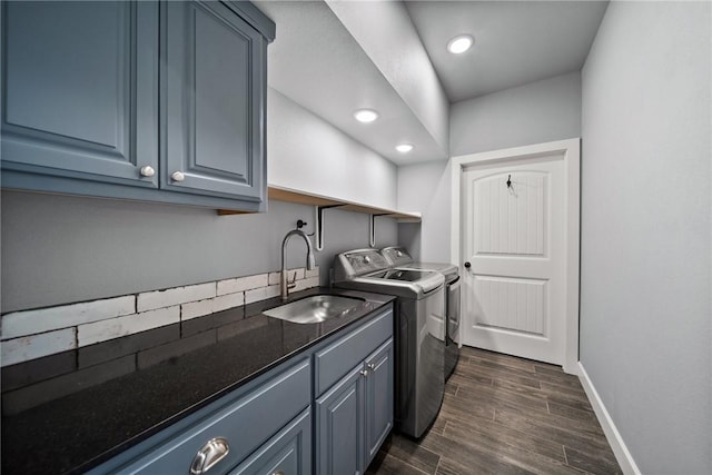 14137 Ozark Dr, Garfield, AR 72732 - laundry area with washer and clothes dryer, dark wood-type flooring, cabinet space, and recessed lighting