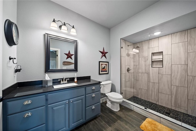 14137 Ozark Dr, Garfield, AR 72732 - full bathroom with vanity, tiled shower, and wood finished floors