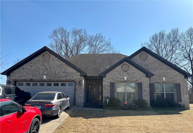 ranch-style home with driveway, roof with shingles, a front lawn, a garage, and brick siding