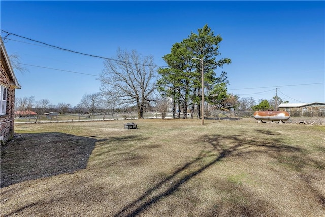 view of yard featuring fence