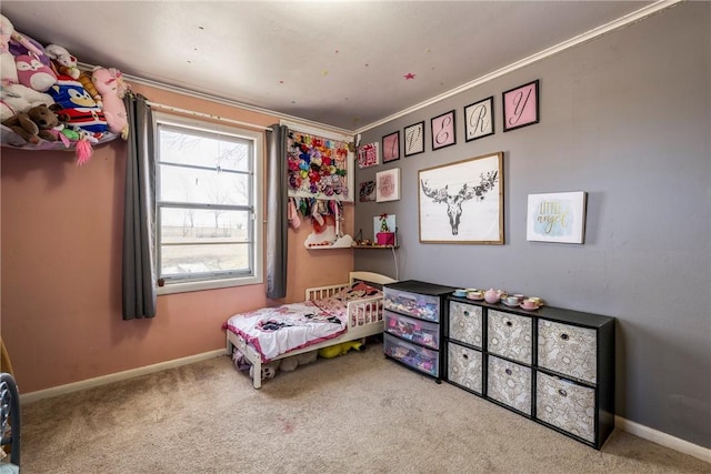 bedroom with baseboards, carpet, and crown molding