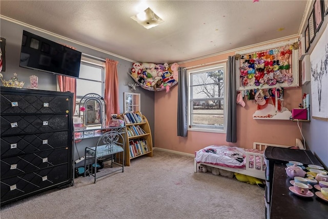 carpeted bedroom featuring baseboards and ornamental molding