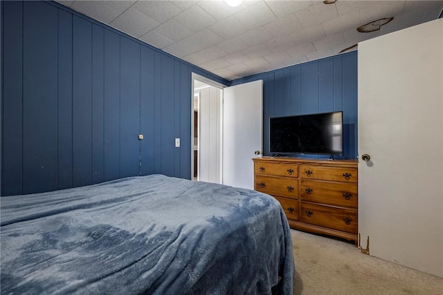 bedroom with light colored carpet