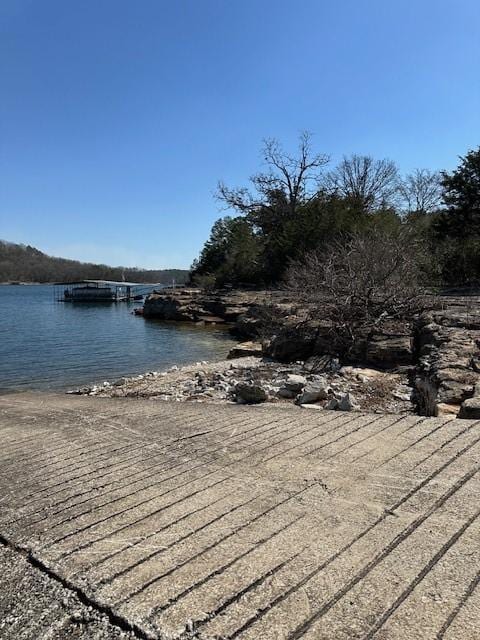 dock area with a water view