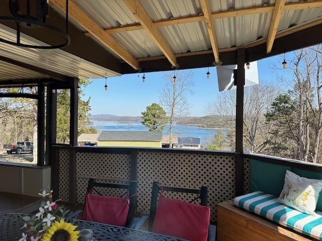 sunroom with a water view