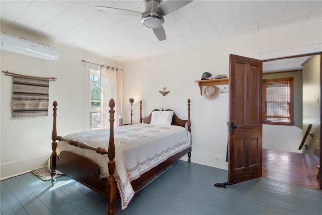 bedroom featuring ceiling fan, ornamental molding, wood-type flooring, and a wall mounted AC