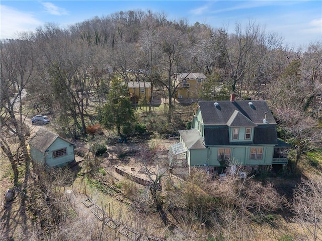 aerial view featuring a view of trees