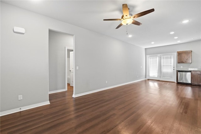 unfurnished living room featuring dark wood finished floors, recessed lighting, baseboards, and ceiling fan