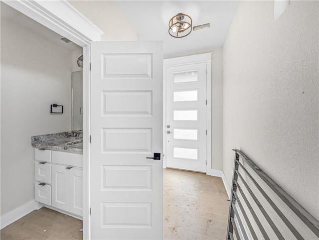 foyer with baseboards