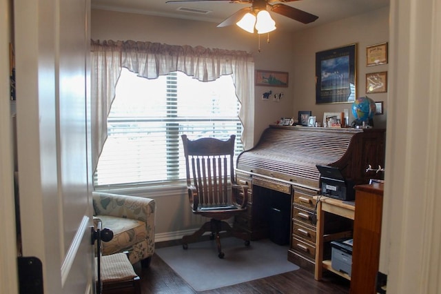 office space featuring visible vents, dark wood-type flooring, and a ceiling fan