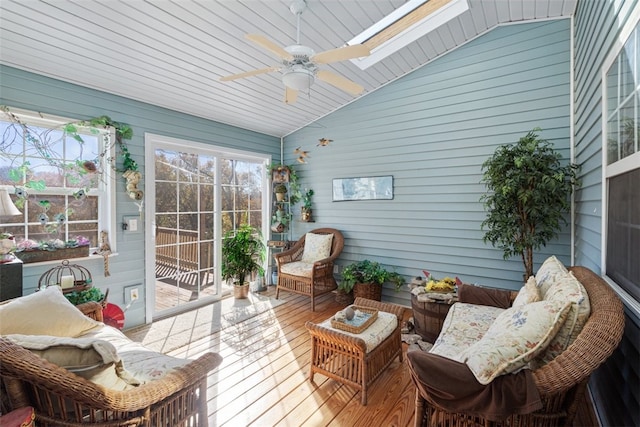 sunroom / solarium featuring vaulted ceiling and a ceiling fan