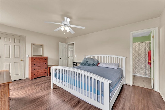 bedroom featuring wood finished floors and ceiling fan