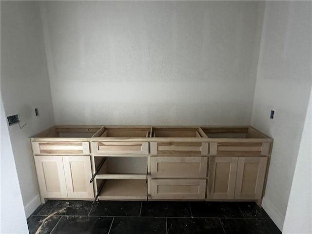 bathroom featuring baseboards