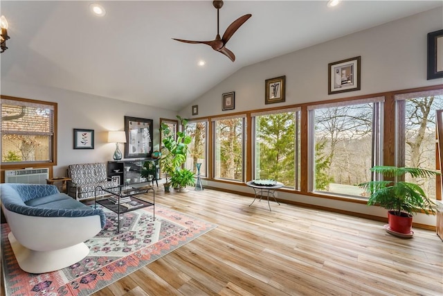 living room with recessed lighting, lofted ceiling, ceiling fan, and wood finished floors