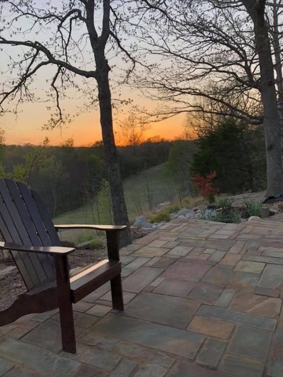 view of patio terrace at dusk