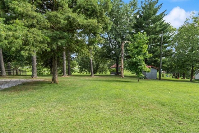 view of yard with fence