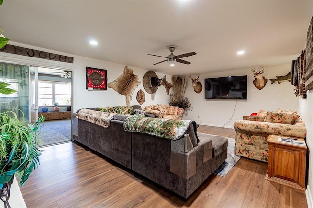 living room with recessed lighting, wood finished floors, and ceiling fan