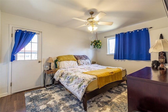 bedroom with wood finished floors and ceiling fan