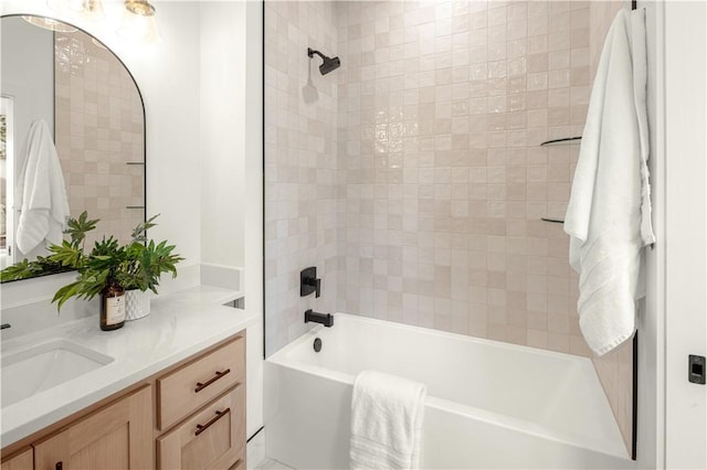 full bath featuring vanity and shower / bathing tub combination