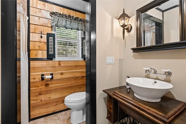 21574 Indian Creek Dr, Garfield, AR 72732 - bathroom with a sink, toilet, and tile patterned floors