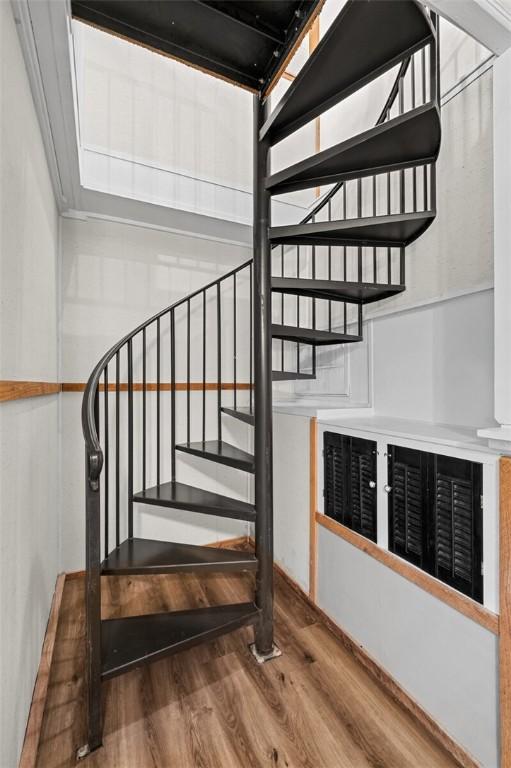 21574 Indian Creek Dr, Garfield, AR 72732 - staircase featuring wood finished floors