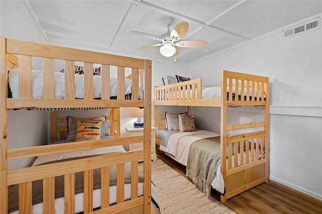 21574 Indian Creek Dr, Garfield, AR 72732 - bedroom featuring visible vents, ceiling fan, and wood finished floors