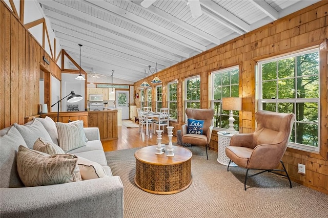 21574 Indian Creek Dr, Garfield, AR 72732 - sunroom featuring lofted ceiling with beams, a wealth of natural light, and ceiling fan