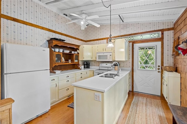 21574 Indian Creek Dr, Garfield, AR 72732 - kitchen featuring light wood-type flooring, light countertops, lofted ceiling with beams, white appliances, and a sink