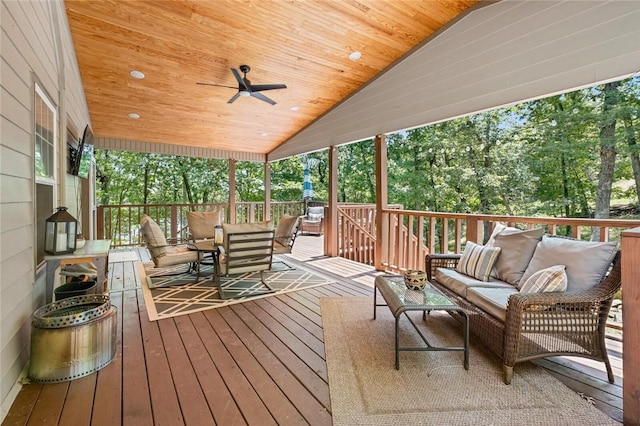 21574 Indian Creek Dr, Garfield, AR 72732 - deck with an outdoor living space and a ceiling fan