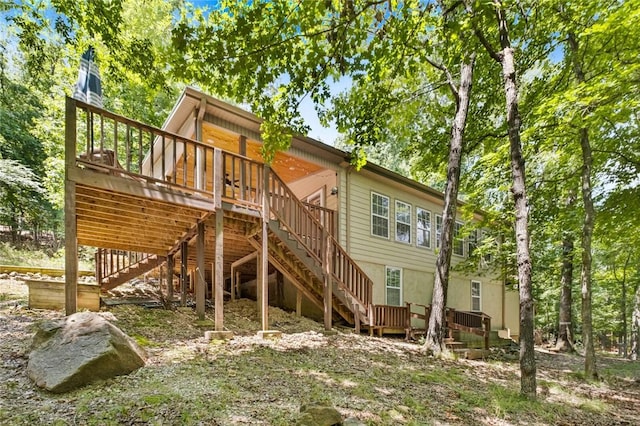 21574 Indian Creek Dr, Garfield, AR 72732 - back of property featuring a deck and stairs