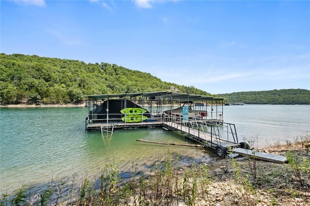 21574 Indian Creek Dr, Garfield, AR 72732 - dock area featuring a forest view, a water view, and boat lift