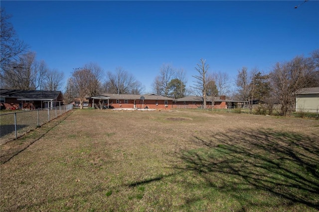 view of yard featuring fence