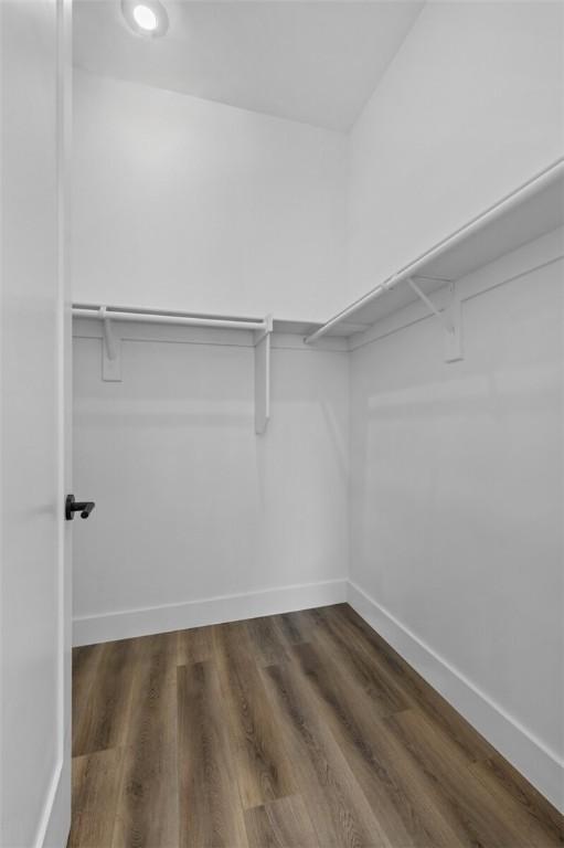 10 Reading Ln, Bella Vista, AR 72714 - walk in closet featuring wood finished floors